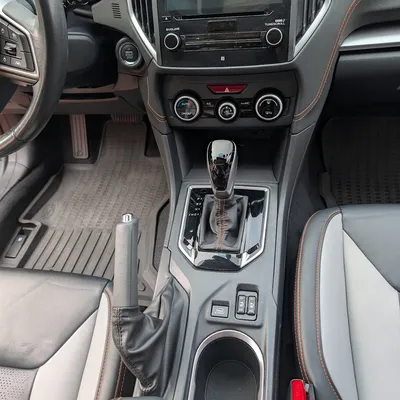 Cleaned and conditioned center console and dashboard after an interior detail by Eagle Eye Auto Detailing
