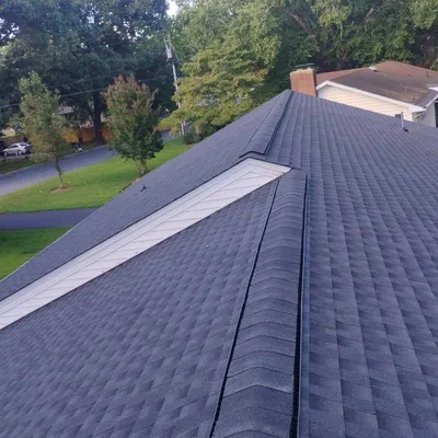 Close-up of finished architectural shingle roofing installed by Eastern Shore Roofing and Remodeling