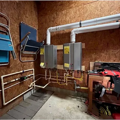 Two tankless water heaters installed side by side by Legar & Son Plumbing in Salisbury, MD
