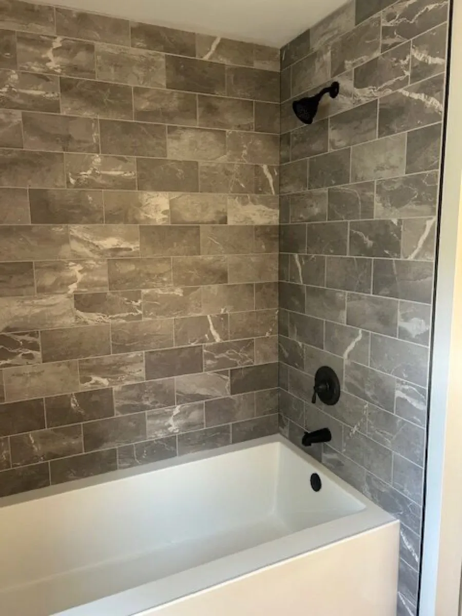 Finished tile shower and tub surround remodel by Legar & Son Plumbing in Salisbury, MD