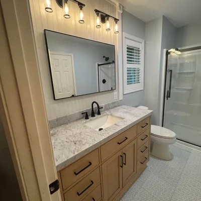 Remodeled bathroom vanity and walk-in shower by Ocean Pines Handyman in Ocean Pines, MD