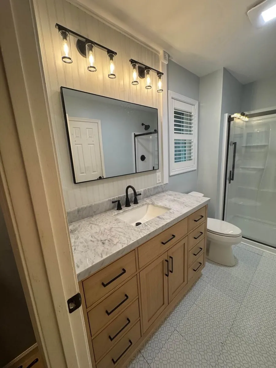 Remodeled bathroom vanity and walk-in shower by Ocean Pines Handyman in Ocean Pines, MD