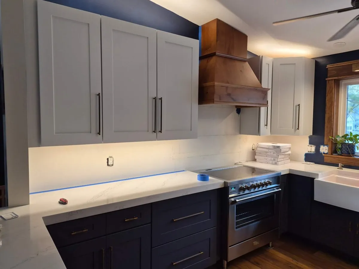 Remodeled kitchen with custom range hood by Ocean Pines Handyman in Ocean Pines, MD