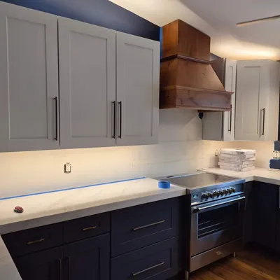 Remodeled kitchen with custom range hood by Ocean Pines Handyman in Ocean Pines, MD