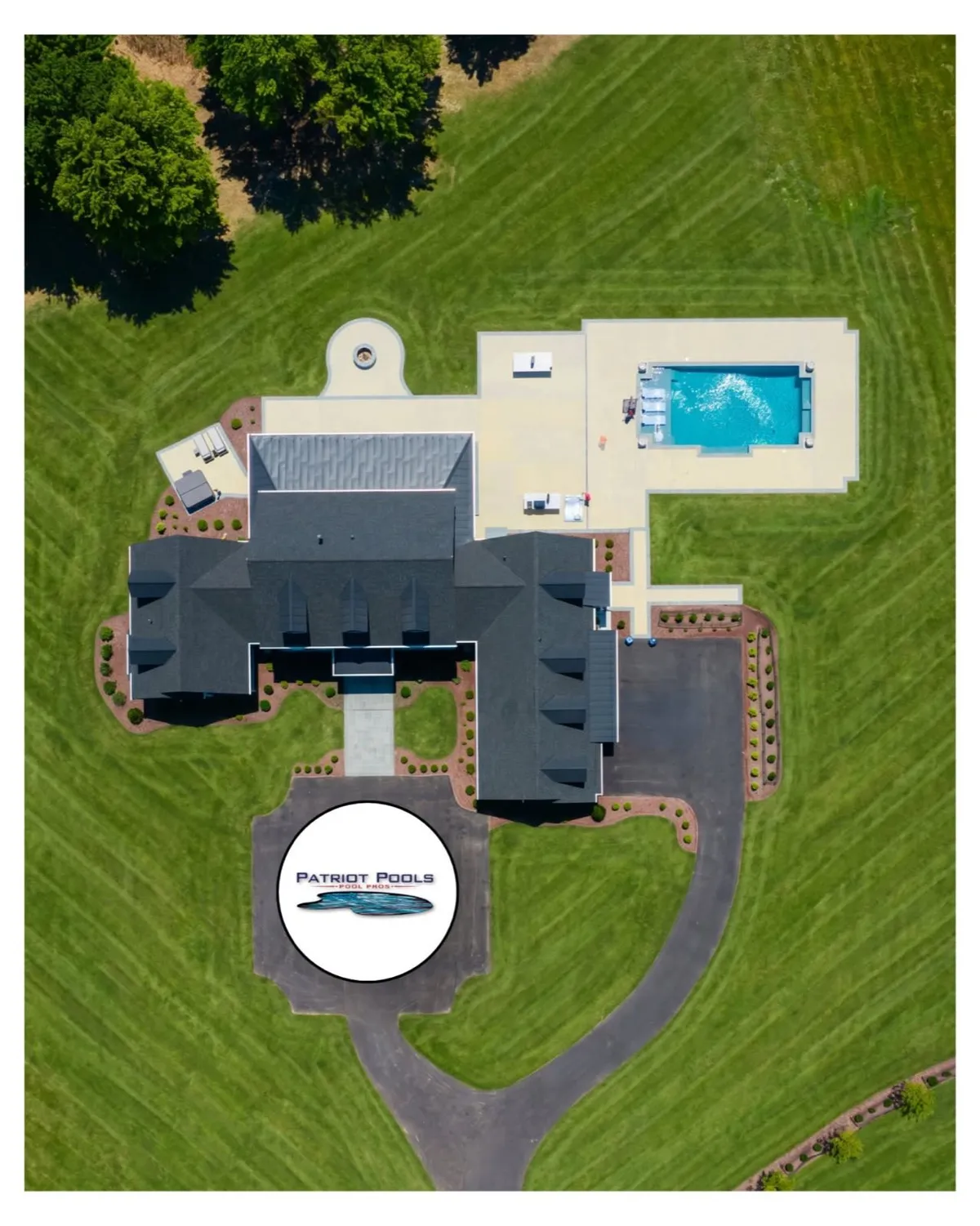 Aerial view of a large in-ground pool installed by Patriot Pools at an estate property near Centreville, MD