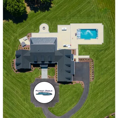 Aerial view of a large in-ground pool installed by Patriot Pools at an estate property near Centreville, MD